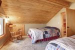 Couloir Cabin loft area with two queen beds.  